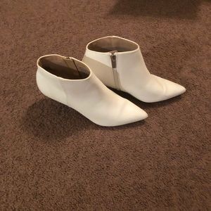 White zip up high heals